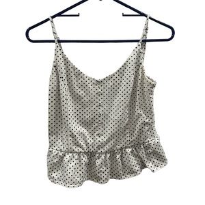 Beautiful white and black dotted blouse from boutique called Sophie Rue.